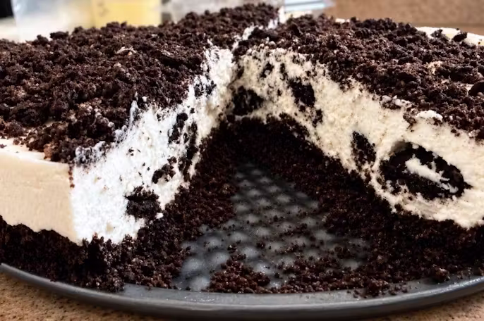 Virginia Beach Oreo cheesecake slice with crushed Oreo cookies